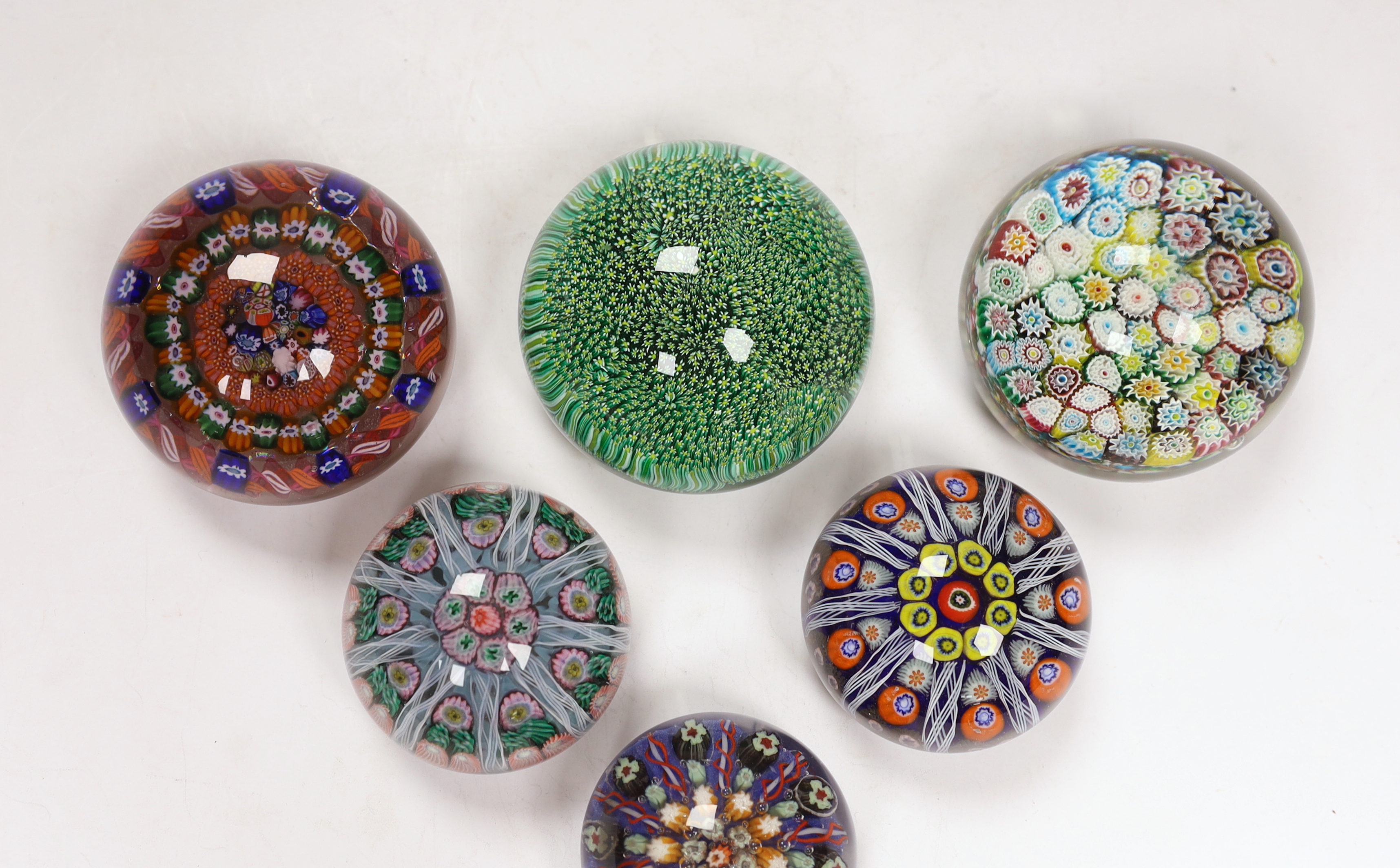 Six various millefiori glass paperweights